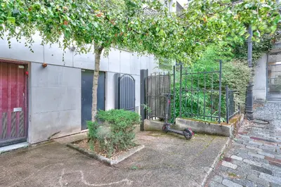 Jardin de l'établissement ParisConciergerie - 2BR apartment 4 people