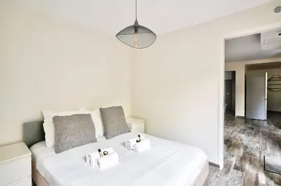 Un ou plusieurs lits dans un hébergement de l'établissement ParisConciergerie - 2BR apartment 4 people