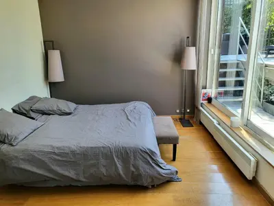Un ou plusieurs lits dans un hébergement de l'établissement Penthouse champs elysées above 5 stars hotel berri champs elysées