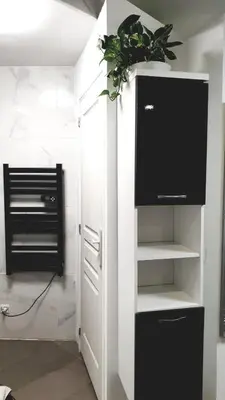 Télévision ou salle de divertissement dans l'établissement Jolie appartement avec 2 chambres partagées