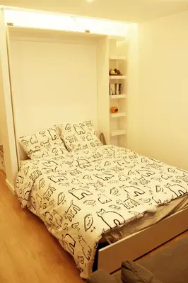 Un ou plusieurs lits dans un hébergement de l'établissement Cosy 1 bedroom Appt Proche de tout Metro à pied