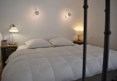 Un ou plusieurs lits dans un hébergement de l'établissement Artist Loft