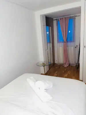 Un ou plusieurs lits dans un hébergement de l'établissement APPARTEMENT AVEC VUE SUR LA TOUR EIIFEL