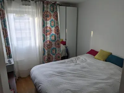 Un ou plusieurs lits dans un hébergement de l'établissement Appartement lumineux Seine, île St-Germain, proche Porte de Versailles et la Défense