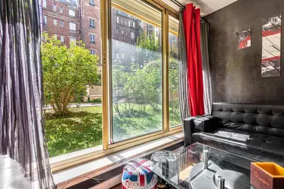 Coin salon dans l'établissement GuestReady - Airy Studio with Courtyard View