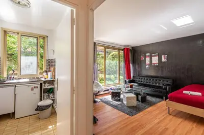 Coin salon dans l'établissement GuestReady - Airy Studio with Courtyard View