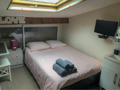 Un ou plusieurs lits dans un hébergement de l'établissement Appartement BASTILLE/MARAIS Gare Lyon