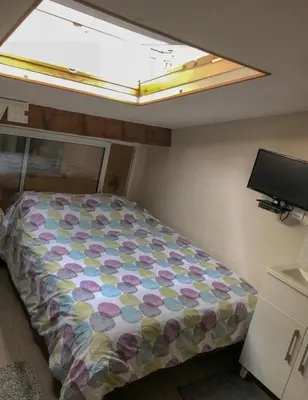 Un ou plusieurs lits dans un hébergement de l'établissement Appartement BASTILLE/MARAIS Gare Lyon