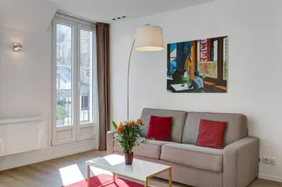 Coin salon dans l'établissement Champs Elysées Apartment