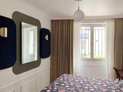 Un ou plusieurs lits dans un hébergement de l'établissement Chambres d'hôtes - Marais