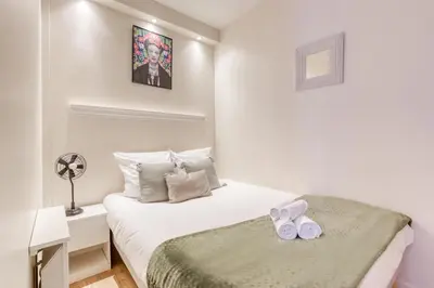 Un ou plusieurs lits dans un hébergement de l'établissement Loft proche PARIS SAINT-LAZARE