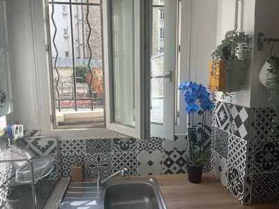 Coin salon dans l'établissement Trendy 2 Rooms Paris 13