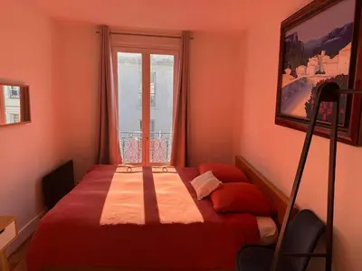 Un ou plusieurs lits dans un hébergement de l'établissement Quiet apartment hill of Montmartre