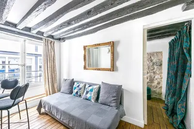 Coin salon dans l'établissement Grands Boulevards - Vivienne 1bdr