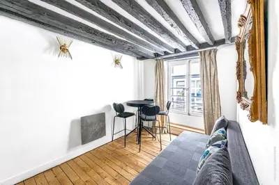 Coin salon dans l'établissement Grands Boulevards - Vivienne 1bdr