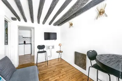 Télévision ou salle de divertissement dans l'établissement Grands Boulevards - Vivienne 1bdr