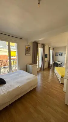 Un ou plusieurs lits dans un hébergement de l'établissement Appartement a Paris