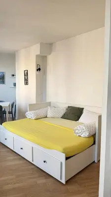 Un ou plusieurs lits dans un hébergement de l'établissement Appartement a Paris