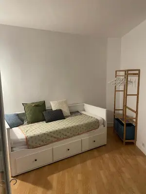Un ou plusieurs lits dans un hébergement de l'établissement Appartement a Paris