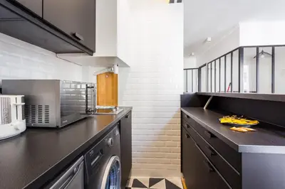 Cuisine ou kitchenette dans l'établissement CMG Résidence Bastille - Saint Antoine