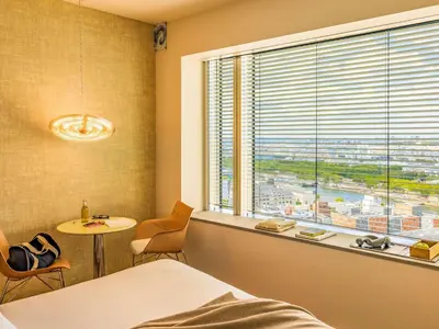Un ou plusieurs lits dans un hébergement de l'établissement Too Hotel & Spa Paris - MGallery Collection