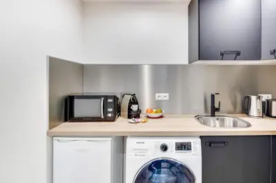 Cuisine ou kitchenette dans l'établissement Sweett - Rue de Lallier