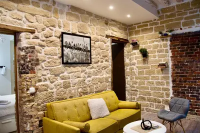 Coin salon dans l'établissement Sweet Virtue-Center of Paris, 2 Bedroom apartment