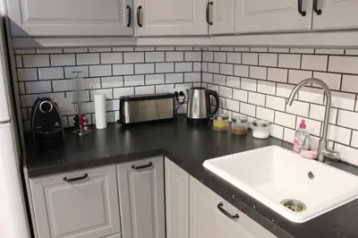 Cuisine ou kitchenette dans l'établissement Sweet Virtue-Center of Paris, 2 Bedroom apartment
