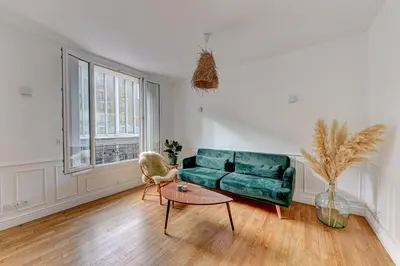 Coin salon dans l'établissement Appartement parisien lumineux proche métro