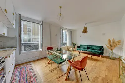Coin salon dans l'établissement Appartement parisien lumineux proche métro
