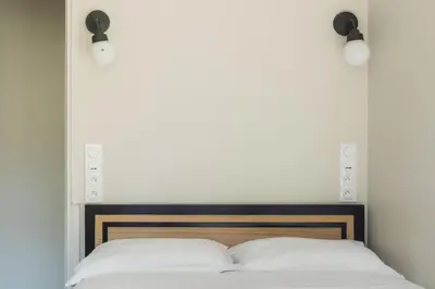 Un ou plusieurs lits dans un hébergement de l'établissement Stylish 2 Bedroom Apartment in Paris
