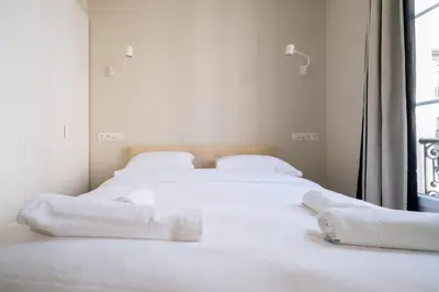 Un ou plusieurs lits dans un hébergement de l'établissement Stunning 1 Bedroom Apartment in Paris