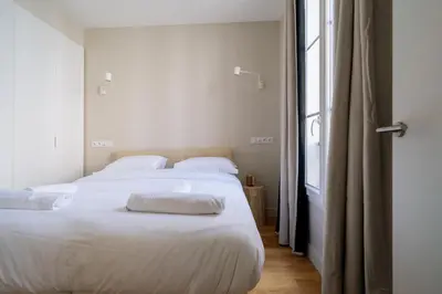 Un ou plusieurs lits dans un hébergement de l'établissement Stunning 1 Bedroom Apartment in Paris