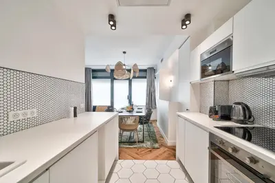 Cuisine ou kitchenette dans l'établissement Splendide appartement pour 6 proche Montmartre