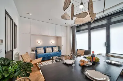 Coin salon dans l'établissement Splendide appartement pour 6 proche Montmartre
