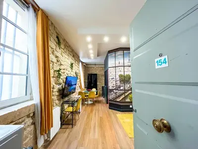 Coin salon dans l'établissement 154 - Urban Atelier Home Cinema in Paris