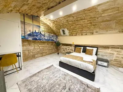 Un ou plusieurs lits dans un hébergement de l'établissement 154 - Urban Atelier Home Cinema in Paris