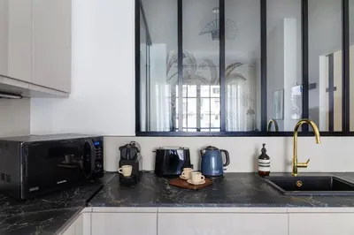 Cuisine ou kitchenette dans l'établissement Le Cygne des Champs-Elysées - Mobility lease