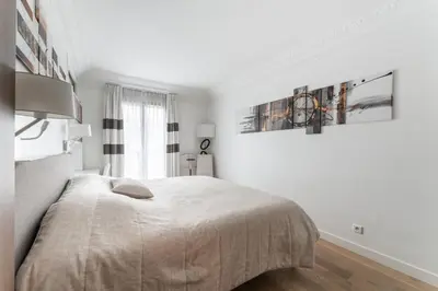 Un ou plusieurs lits dans un hébergement de l'établissement Appartement Haussmannien - dernier étage