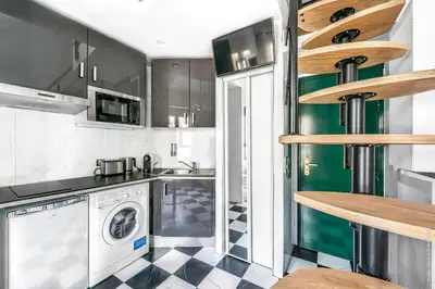 Cuisine ou kitchenette dans l'établissement Studio Colisee - Champs Elysees by B'Your Home