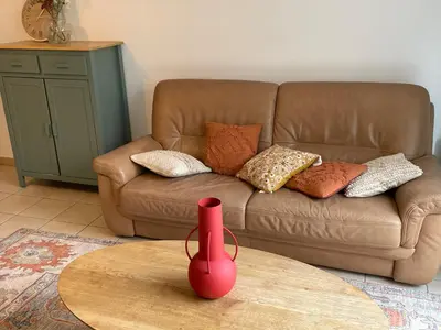 Coin salon dans l'établissement Maison agréable et spacieuse aux portes de Paris et du métro