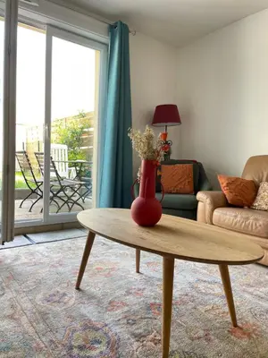 Coin salon dans l'établissement Maison agréable et spacieuse aux portes de Paris et du métro