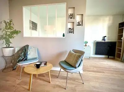 Coin salon dans l'établissement Appartement en résidence calme / Puteaux - La Défense