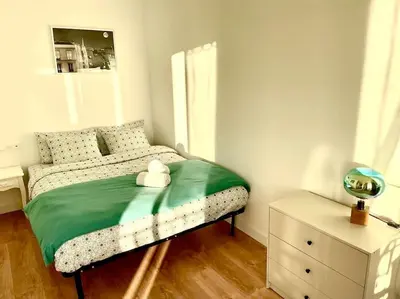 Un ou plusieurs lits dans un hébergement de l'établissement Appartement en résidence calme / Puteaux - La Défense