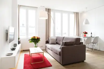 Coin salon dans l'établissement Arc de Triomphe Apartment