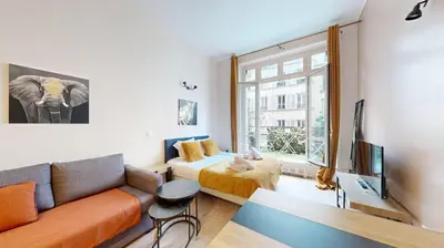 Coin salon dans l'établissement 252 Suite Majestic - Superbe Appartement à Paris