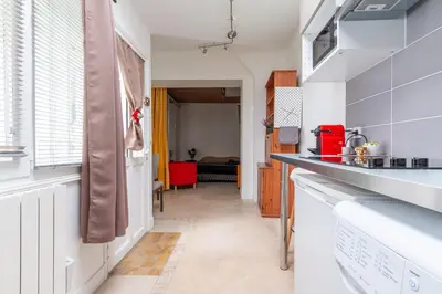 Cuisine ou kitchenette dans l'établissement Nid d'amour - à 900m de la Tour Eiffel