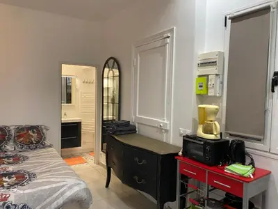 Un ou plusieurs lits dans un hébergement de l'établissement Studio @Paris-Centre Montmarte Sacre-coeur Opera Louvre