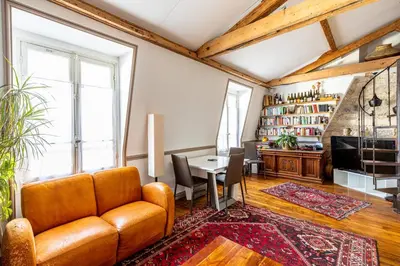Coin salon dans l'établissement GuestReady - Charming apartment with mezzanine