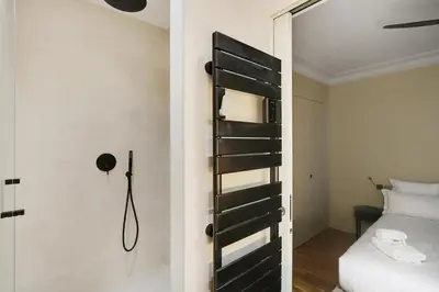 Un ou plusieurs lits dans un hébergement de l'établissement Pick A Flat's Apartment in Opéra - Rue Saulnier
